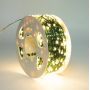 Гірлянда роса на котушці 500-1000Led 50-100м зелений провід+пульт, теплий білий